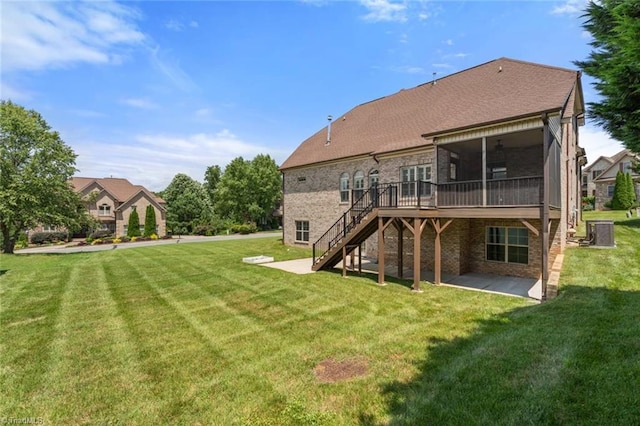 142 Covington Pl, Lewisville, NC 27023 - rear view of property featuring a patio, a lawn, stairway, and a sunroom