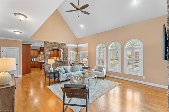 142 Covington Pl, Lewisville, NC 27023 - living area with a ceiling fan, light wood-style floors, high vaulted ceiling, a chandelier, and recessed lighting