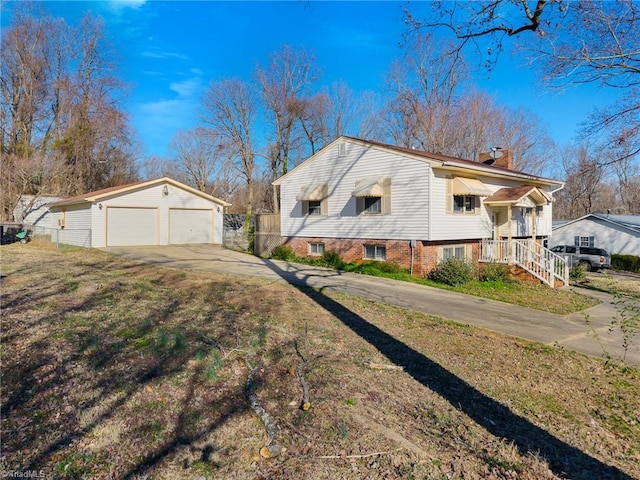 view of property exterior with a garage, an outdoor structure, and a chimney