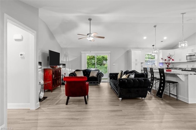 111 Brooke Ridge Dr, Thomasville, NC 27360 - living room featuring vaulted ceiling, a ceiling fan, light wood-style floors, healthy amount of natural light, and recessed lighting