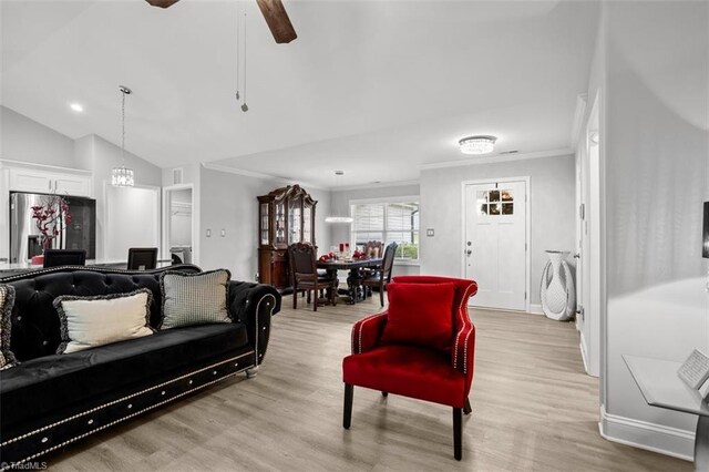111 Brooke Ridge Dr, Thomasville, NC 27360 - living area featuring crown molding, light wood-style flooring, lofted ceiling, ceiling fan, and baseboards