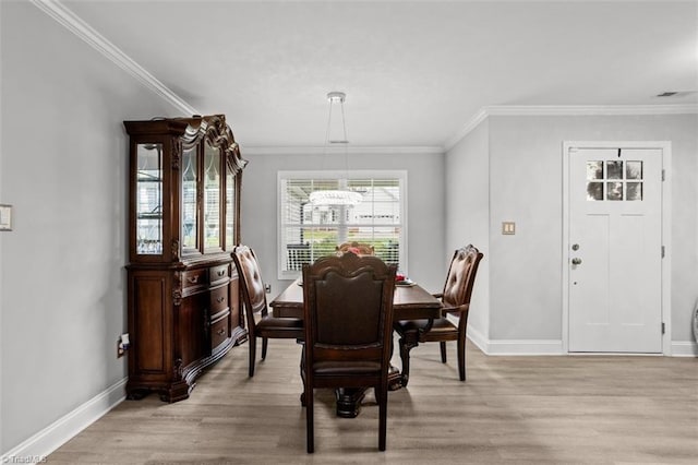 111 Brooke Ridge Dr, Thomasville, NC 27360 - dining area with a chandelier, light wood-style flooring, baseboards, and ornamental molding