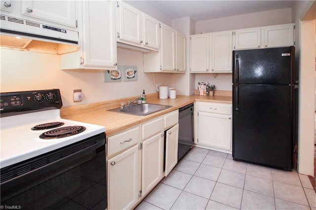 kitchen featuring under cabinet range hood, light countertops, black appliances, white cabinetry, and a sink