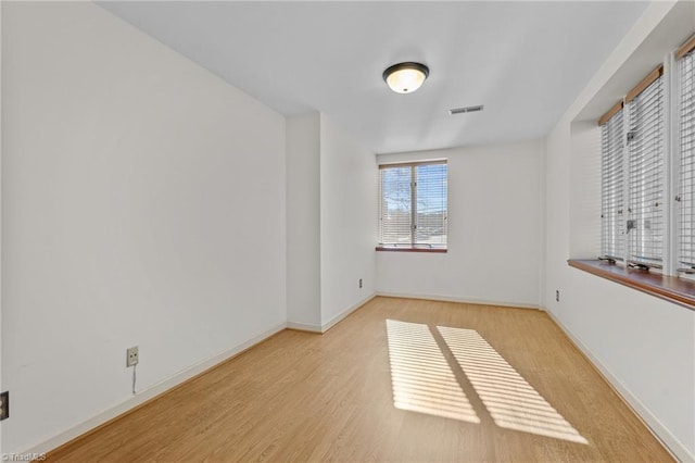 empty room featuring light hardwood / wood-style floors