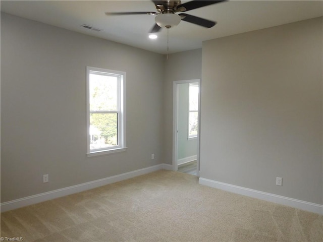 4391 Old Town Dr, Winston-Salem, NC 27106 - spare room featuring visible vents, light colored carpet, a ceiling fan, and baseboards