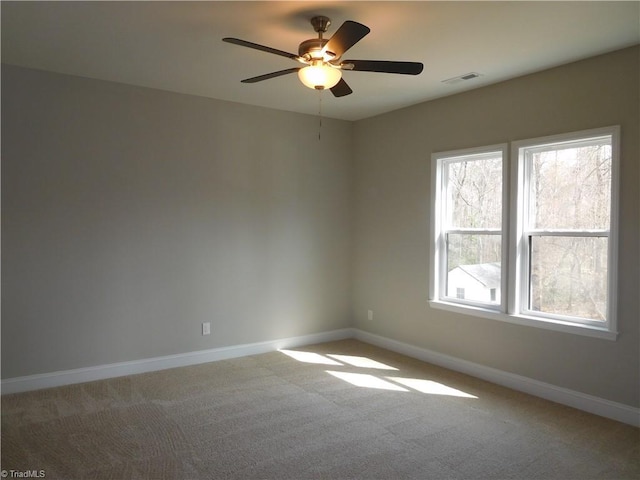 4391 Old Town Dr, Winston-Salem, NC 27106 - empty room featuring visible vents, baseboards, a ceiling fan, and carpet flooring