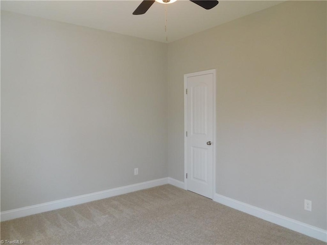 4391 Old Town Dr, Winston-Salem, NC 27106 - spare room with light colored carpet, baseboards, and ceiling fan