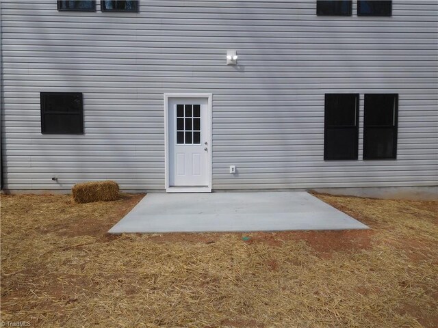 4391 Old Town Dr, Winston-Salem, NC 27106 - view of exterior entry with a patio