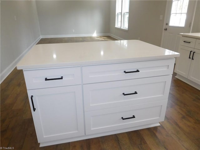 4391 Old Town Dr, Winston-Salem, NC 27106 - interior space featuring a kitchen island, white cabinets, dark wood finished floors, and light countertops