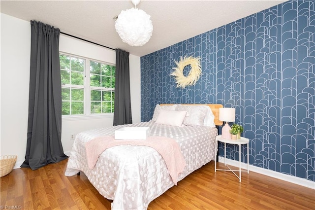 bedroom featuring hardwood / wood-style flooring