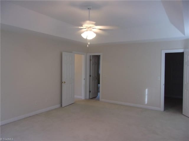 interior space with ceiling fan