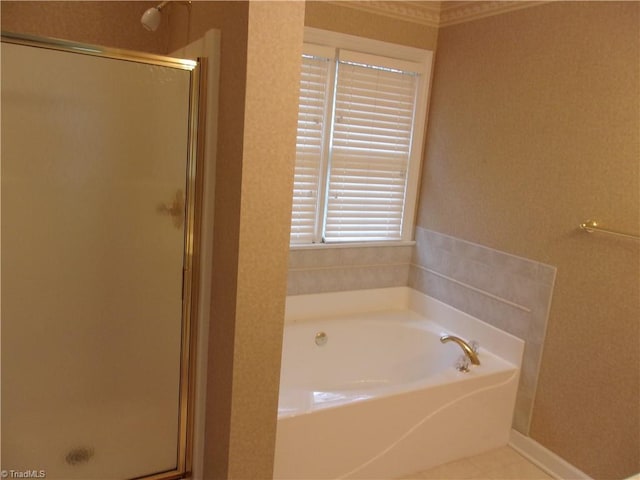 bathroom with shower with separate bathtub