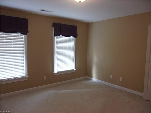 view of carpeted spare room