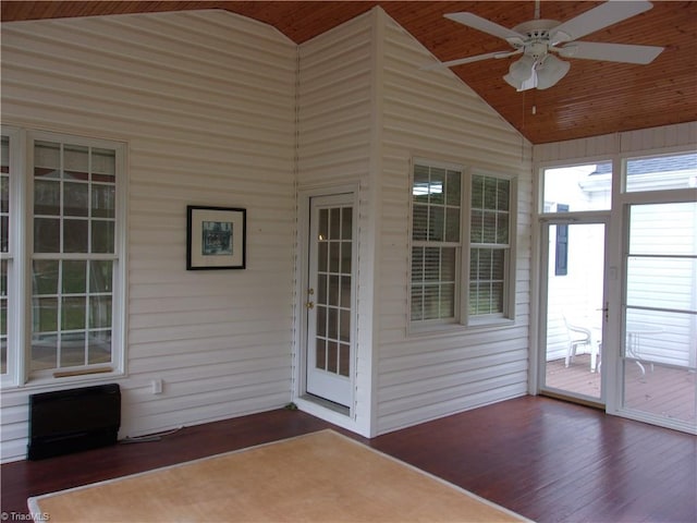 unfurnished sunroom featuring wooden ceiling, ceiling fan, and lofted ceiling