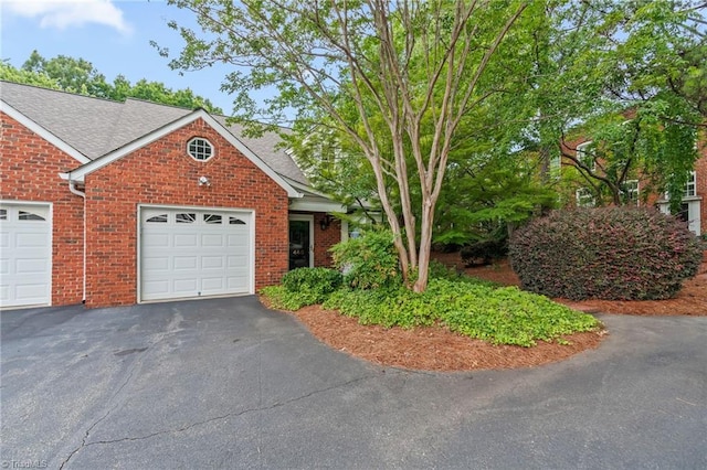 440 Marshall View Ct, Winston-Salem, NC 27101 - view of front of house with brick siding, asphalt driveway, a shingled roof, and a garage