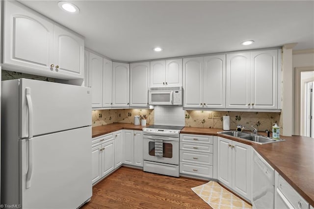 440 Marshall View Ct, Winston-Salem, NC 27101 - kitchen featuring white appliances, white cabinets, dark wood-style floors, tasteful backsplash, and recessed lighting