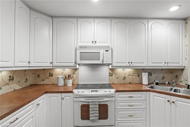 440 Marshall View Ct, Winston-Salem, NC 27101 - kitchen featuring white appliances, white cabinetry, and tasteful backsplash