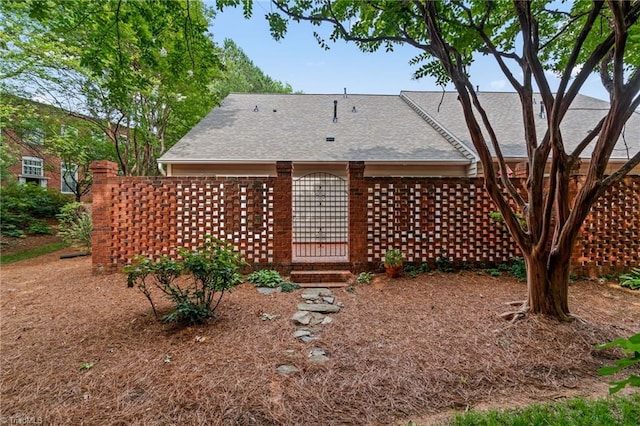 440 Marshall View Ct, Winston-Salem, NC 27101 - back of house featuring brick siding, a shingled roof, and entry steps