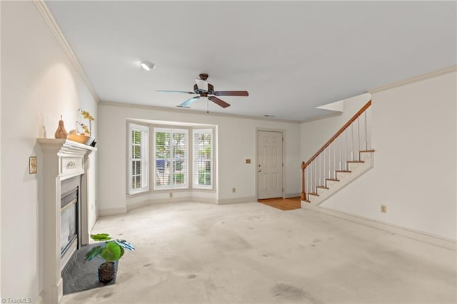 440 Marshall View Ct, Winston-Salem, NC 27101 - unfurnished living room with ornamental molding, stairs, carpet, ceiling fan, and a glass covered fireplace