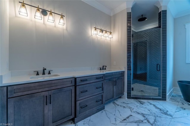 bathroom with crown molding, vanity, and an enclosed shower