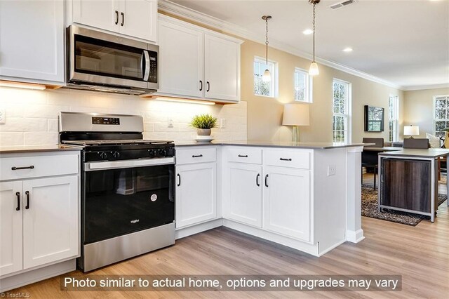 4000 Winding Vine Ln Lot 54, Greensboro, NC 27410 - kitchen with appliances with stainless steel finishes, ornamental molding, a peninsula, light wood-style flooring, and white cabinets