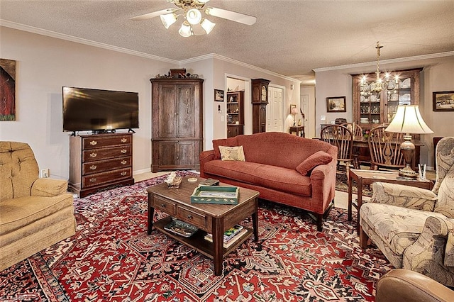 carpeted living room featuring a textured ceiling, ceiling fan with notable chandelier, and ornamental molding