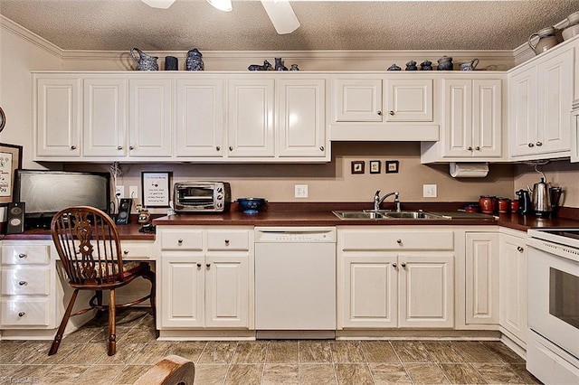 kitchen featuring a textured ceiling, crown molding, sink, and white appliances