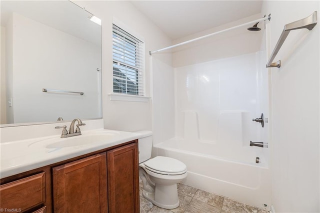 full bath featuring toilet, tub / shower combination, and vanity