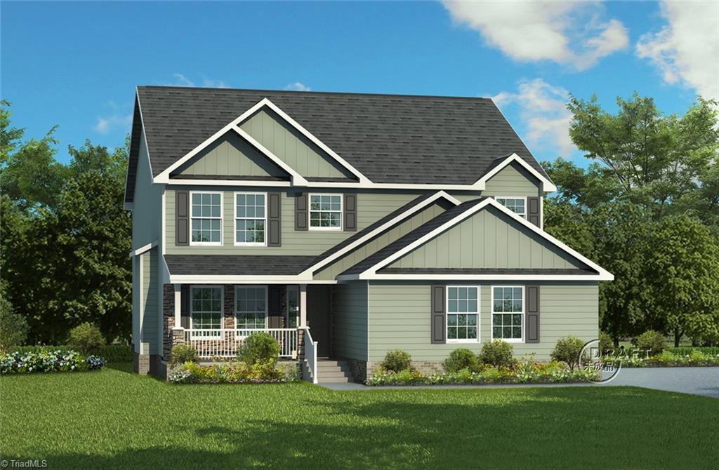view of front of house featuring board and batten siding, covered porch, and a front lawn