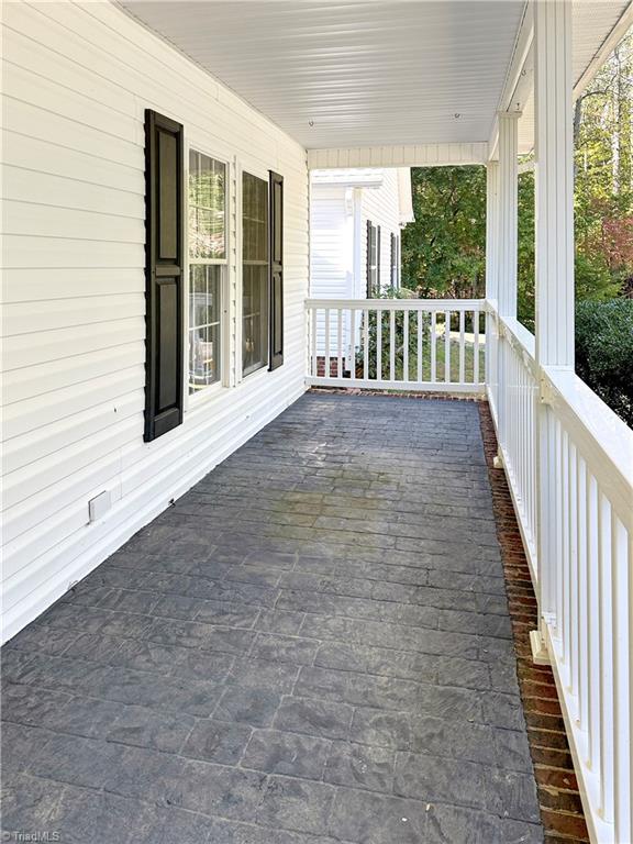 wooden terrace with covered porch