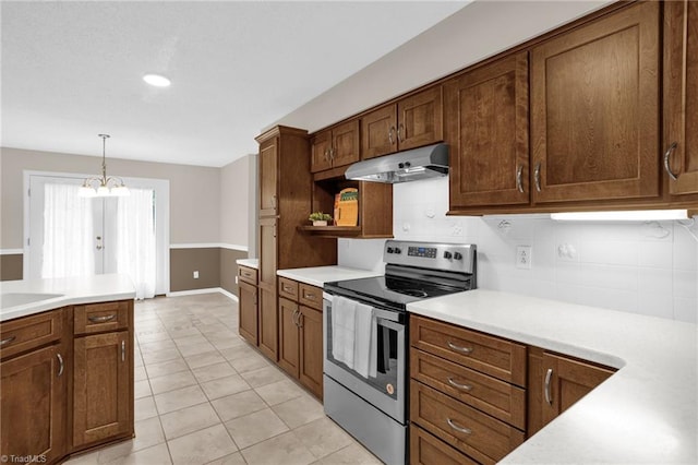 7060 Orchard Path Dr, Clemmons, NC 27012 - kitchen featuring stainless steel electric range oven, under cabinet range hood, decorative backsplash, light countertops, and open shelves
