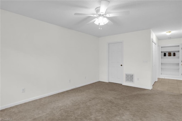 7060 Orchard Path Dr, Clemmons, NC 27012 - carpeted empty room featuring ceiling fan and baseboards