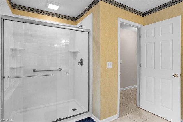 7060 Orchard Path Dr, Clemmons, NC 27012 - bathroom with a stall shower, tile patterned floors, and baseboards