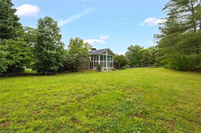 7060 Orchard Path Dr, Clemmons, NC 27012 - view of green lawn featuring a sunroom