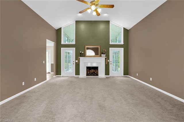 7060 Orchard Path Dr, Clemmons, NC 27012 - unfurnished living room with high vaulted ceiling, ceiling fan, carpet flooring, a premium fireplace, and baseboards