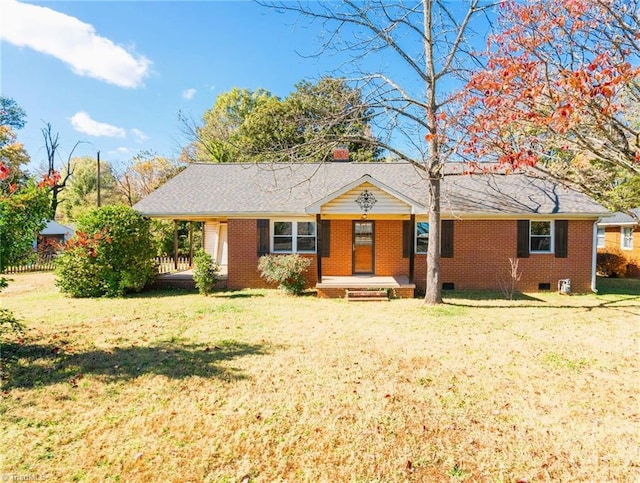 ranch-style home featuring a front yard