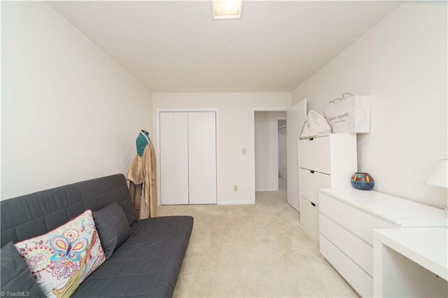 living area featuring light colored carpet