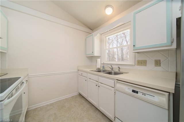 kitchen with tasteful backsplash, lofted ceiling, sink, white cabinets, and white appliances