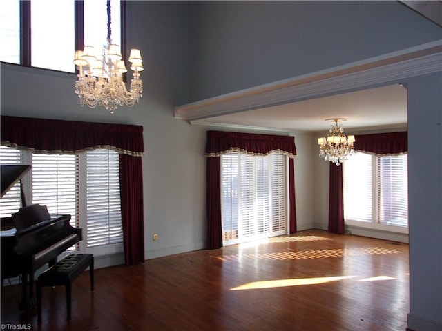 interior space featuring a chandelier, hardwood / wood-style floors, and plenty of natural light