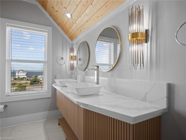 bathroom featuring vanity, vaulted ceiling, and wood ceiling