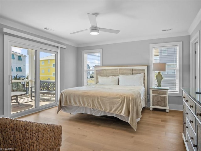 bedroom with ceiling fan, ornamental molding, access to outside, and light hardwood / wood-style flooring