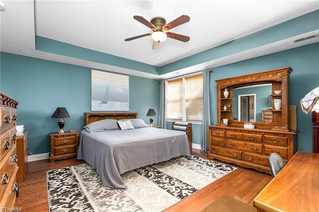 bedroom featuring hardwood / wood-style flooring and ceiling fan