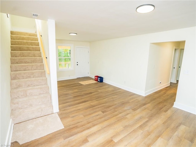 spare room with light wood-type flooring