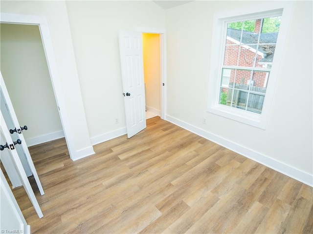 unfurnished bedroom featuring light hardwood / wood-style flooring