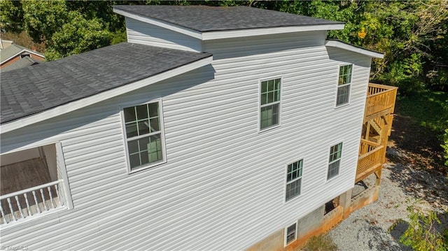 view of side of home featuring a deck