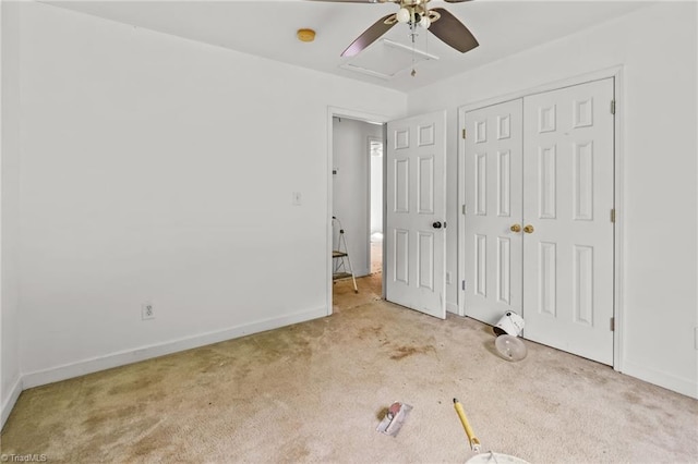 4812 Country Meadows Dr, Julian, NC 27283 - unfurnished bedroom with carpet, baseboards, a closet, and a ceiling fan