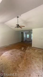 4812 Country Meadows Dr, Julian, NC 27283 - unfurnished living room with ceiling fan and vaulted ceiling