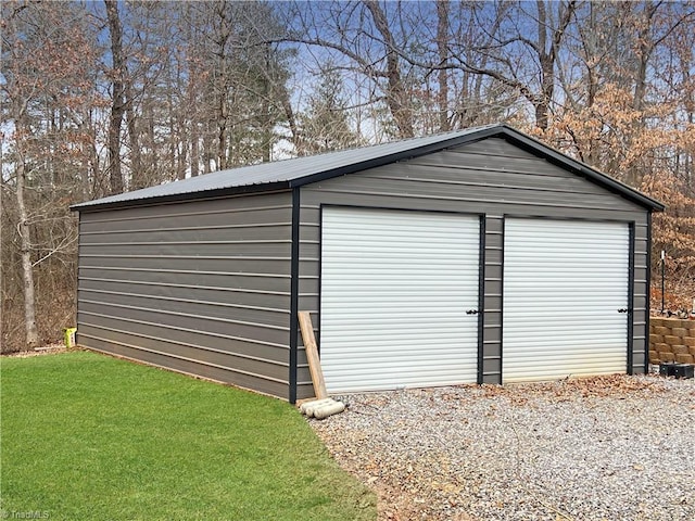 view of outbuilding with a garage