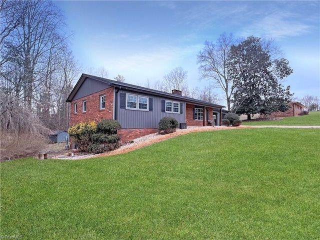 ranch-style home with a front lawn