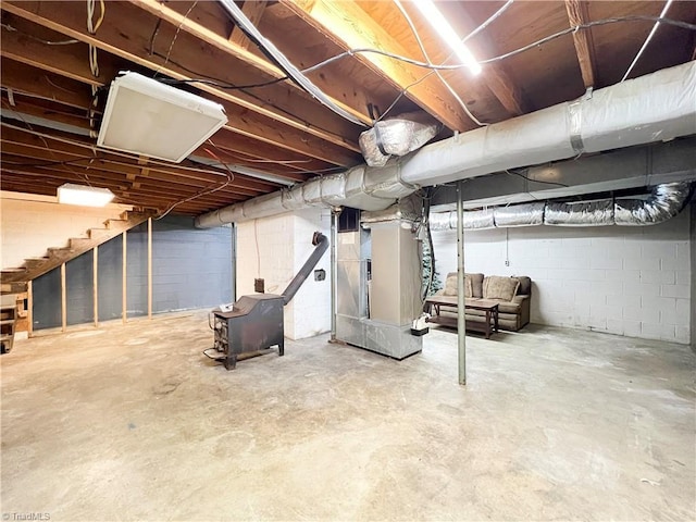 basement featuring heating unit